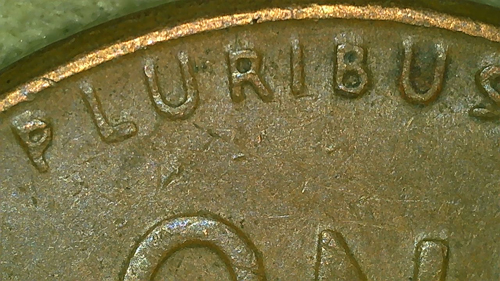 1958-Wheat-Penny-Noticed-Something-Weird-In-Lettering-Of-Pluribus